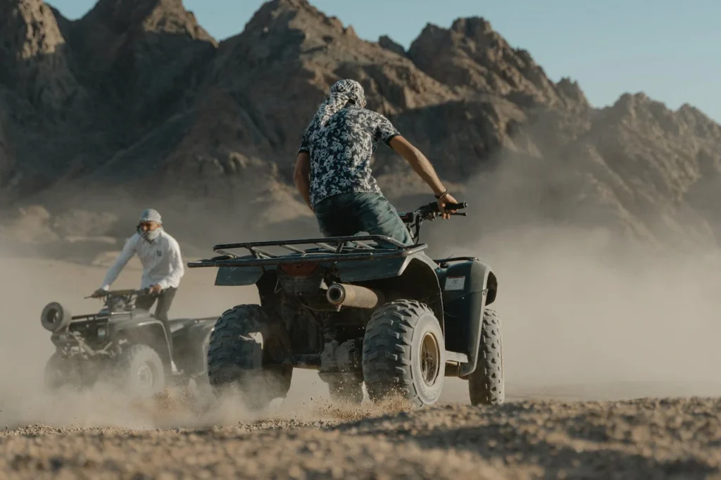 man-in-black-and-white-floral-shirt-riding-black-and-white-atv-5976946 (1) quad-bikes-in-the-desert-at-sharm-el-sheikh