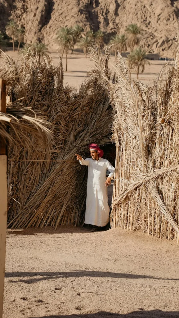 man-in-traditional-clothing-standing-in-shed-on-desert-26793135 quad-bikes-in-the-desert-at-sharm-el-sheikh 66