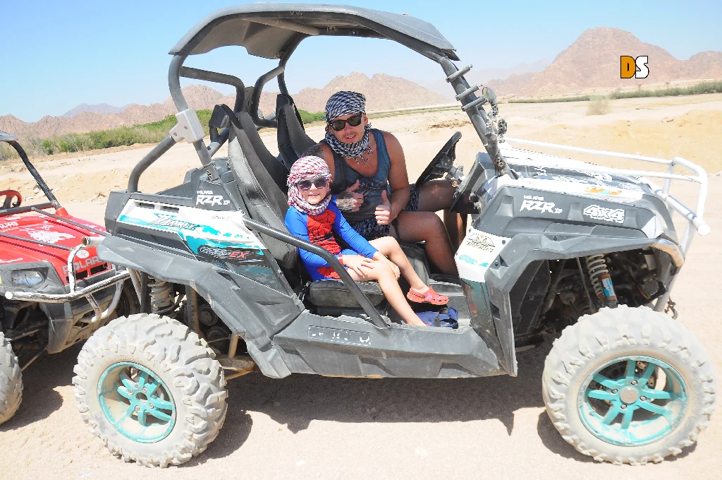 2-seater dune buggy safari Sharm El Sheikh – couple riding through Sinai desert