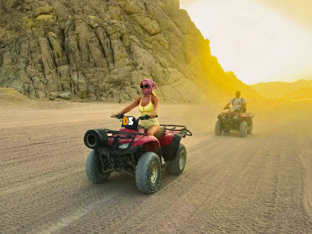 Desert safari sunset tour in Sharm El Sheikh – golden Sinai landscape at dusk